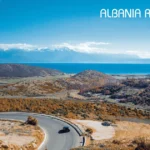 Albanian Riviera road trip coastal view, Ksamil Albania turquoise beach, historic town of Berat Albania, Gjirokaster Albania old town, Llogara Pass Albania road trip, Albania road trip itinerary map